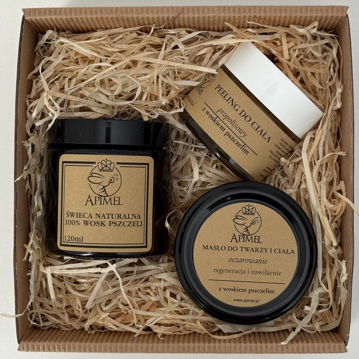 zestaw prezentowy Apimel świeca z wosku pszczelego peeling propolisowy masło do twarzy i ciała