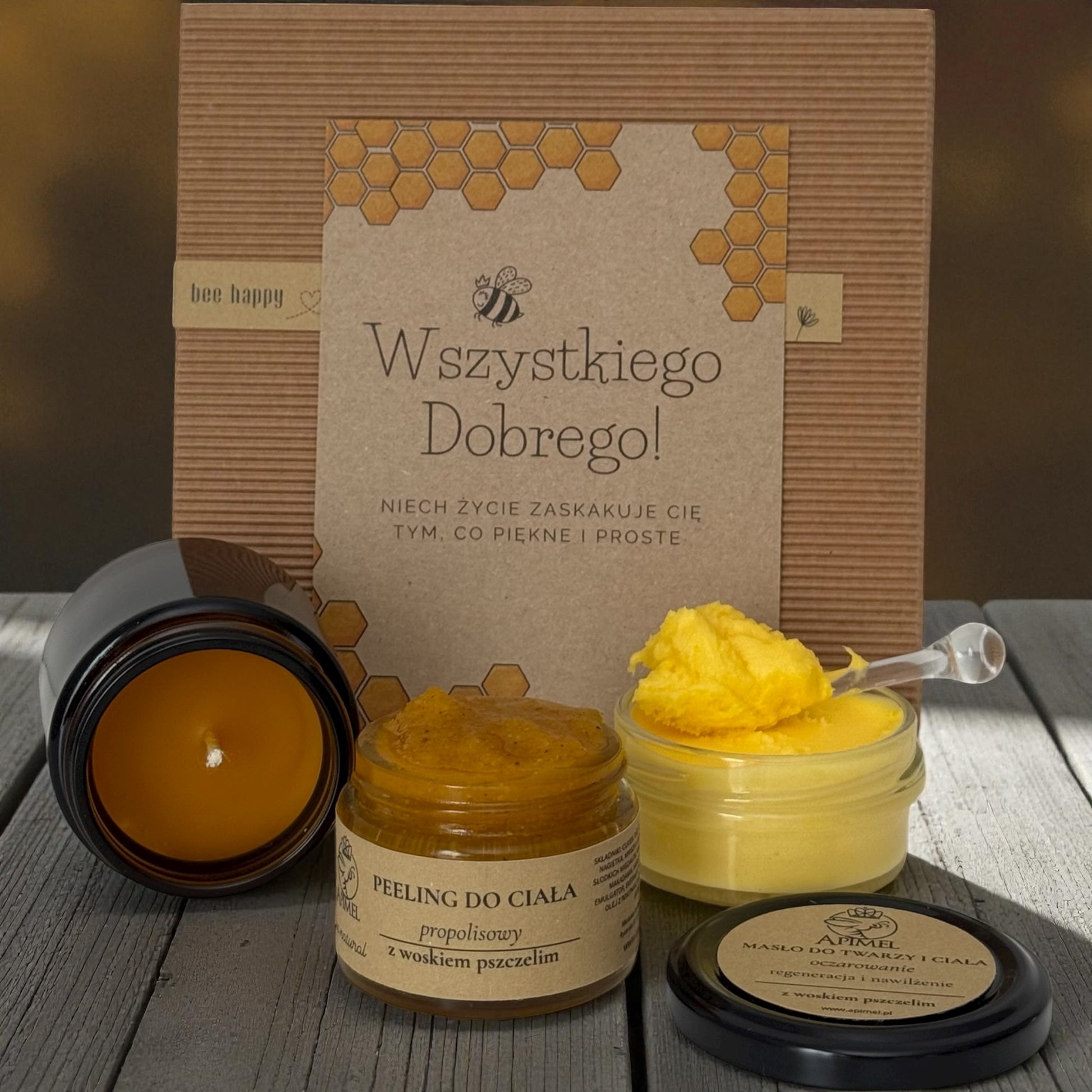 Zestaw prezentowy z kosmetykami naturalnymi Apimel świeca z wosku pszczelego peeling propolisowy masło do twarzy i ciała